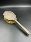 A silver backed dressing table brush, hallmarked for Birmingham 1938 by William Neale