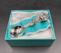 A sterling silver Christmas themed caddy spoon by Tiffany and Co marked 925 (Approx weight 47.6g)