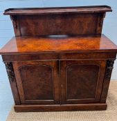 A Victorian walnut chiffonier with galleried top, and two drawers over two cupboards (H129cm