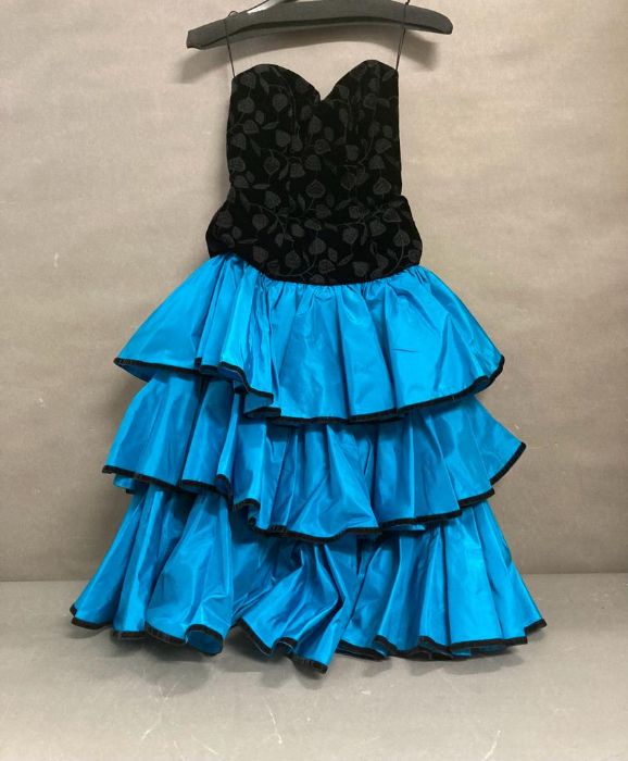 A vintage 1980's strapless dress in blue and black by Emanuel size 10