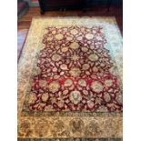 A red ground floral rug/carpet, made in India 318cm x 244cm