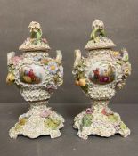 A pair of Dresden style two handled lidded urns decorated with flowers and frost H23cm