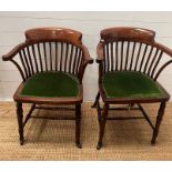 A pair of Edwardian tub chairs