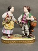 An Augustus Rex porcelain figure of Children with baskets