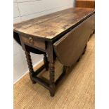 Drop sided dining table on barley twist legs