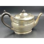 A silver teapot by Harrison Brothers & Howson, hallmarked for Sheffield 1936 and weighing