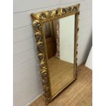 A mirror with gilt style surround, label reading 'Duchess of Sutherland Thatched House Richmond'