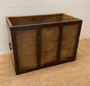 A large wooden steel banded crate (49cm x 63cm x 90cm)