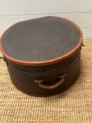 A leather bound vintage hat box