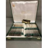 A boxed set of French silver plate fish knives and forks by Dauex of Paris