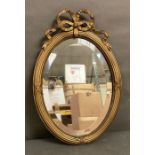 A gilt framed Rococo style hall mirror 36cm x 53cm