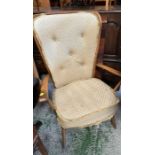 An Ercol blonde evergreen high back chair