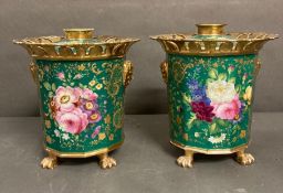 A pair of 19th Century French green ground potpourri urns