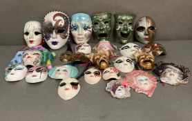 A selection of Venetian style and harlequin wall hanging masks
