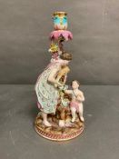 An 19th Century German porcelain single candlestick with figural design with child H39cm