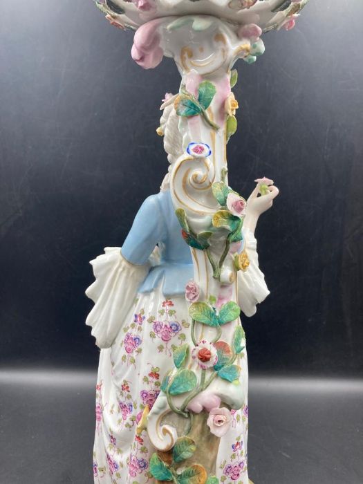 An 19th Century porcelain figural centrepiece depicting woman carrying flowers - Image 5 of 5