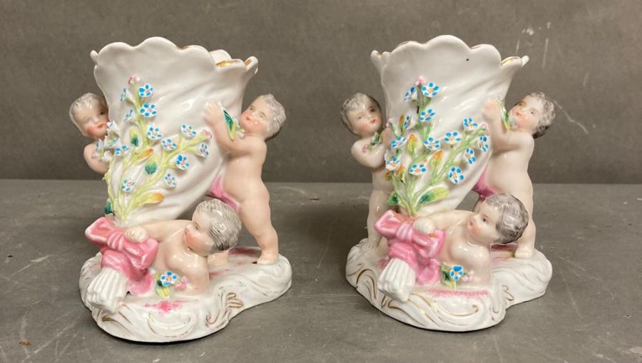 A pair of 19th Century French Putti vases H12cm