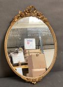 A gilt framed Rococo style hall mirror 48cm x 34cm