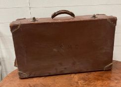 A leather suitcase with initials SMC (H23cm W70cm D40cm)