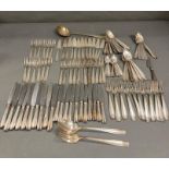 An extensive selection of silver plated cutlery by Ercius of Paris, 105 items in total to include