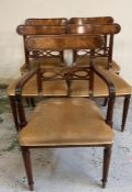 A set of five mahogany Edwardian dining chairs upholstered in gold