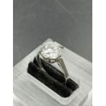 A diamond set single stone ring, comprising a round brilliant cut Lab grown diamond measuring 10.