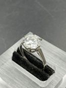 A diamond set single stone ring, comprising a round brilliant cut Lab grown diamond measuring 10.