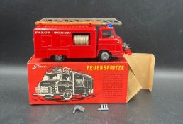 A vintage Tekno Volvo Falck Zonen fire truck, boxed