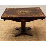 A Rosewood card table with floral decorative inlay opening to a red baize on a single central column