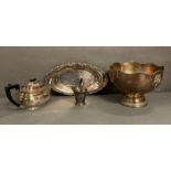 A selection of silver plated items to include a tea pot, ice wine cooler and a tray