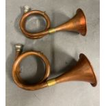 Two copper hunting's horns