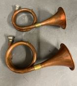 Two copper hunting's horns