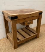 A Vintage maple butchers block on pine base with slated shelf and single drawer. (H88cm W90cm