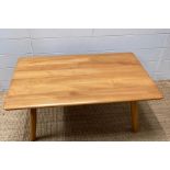 An Ercol Mid Century coffee table with shelf under (H38cm W99cm D68cm)