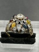 A gemstone ring in a 14k white gold setting (Approximate total weight 5.5g) Size P