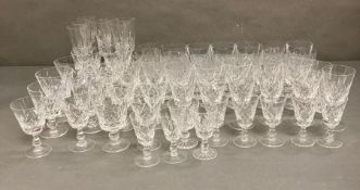 A large selection of cut glassware to include red and white wine glasses, tumblers and champagne