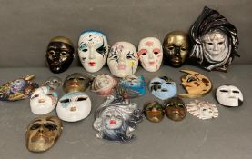 A selection of wall hanging Venetian style masks