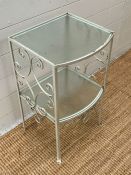 A wrought iron and glass top side table (H55cm W35cm D33cm)