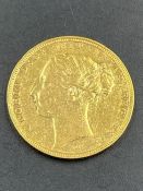 An 1885 Victorian gold sovereign