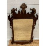 An Italian style carved wood mirror