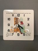 A mechanical old mother Hubbard wall nursery clock