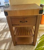 A wooden butchers block with shelves under (H90cm W60cm D60cm)