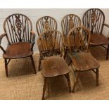 Four wheel back chairs and two carver chairs