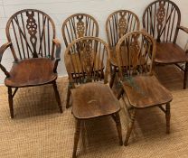 Four wheel back chairs and two carver chairs