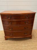 Yew bow fronted four drawer chest (H84cm W85cm D55cm)