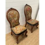A pair of Victorian nursing chairs