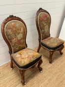 A pair of Victorian nursing chairs