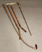 A selection of riding crops, one Victorian with a 15ct gold mount and top, hallmarked for London