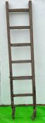 A vintage wooden ladder