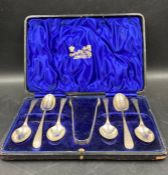 A boxed set of silver teaspoons and sugar nips, hallmarked for Sheffield 1901 by John Round & Son